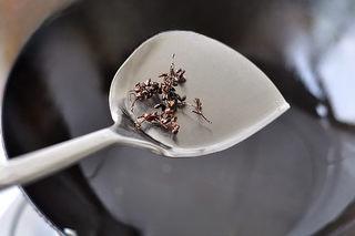 Mapo Tofu with Peanuts step 10: Once the tofu turns slightly golden, remove it and set aside to drain excess oil