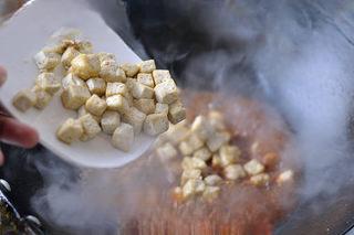 Mapo Tofu with Peanuts step 14: Pour in the prepared sauce and stir well.