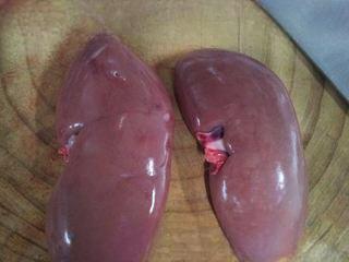 Pork Kidney Stir-Fry step 2: Rinse the pork kidneys and remove the outer membrane.