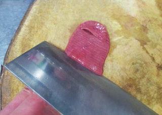 Pork Kidney Stir-Fry step 5: Score the inside of each kidney at a 45-degree angle.