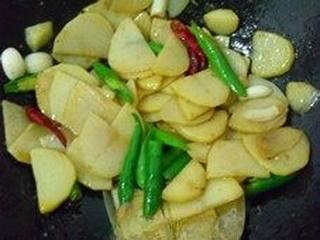Recipe Title step 5: Add the green bell peppers and stir-fry until they are just cooked.