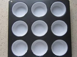 Cake Recipe step 8: Line cupcake molds with paper liners.