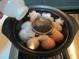 Five-Spice Botanical Tea Eggs step 6: Place the wrapped eggs in a pot of cold water. Add the spice mixture, soy sauce,