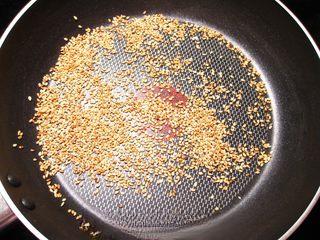 Spinach Salad with Goji Berries and Sesame Dressing step 1: Toast the sesame seeds in a dry pan until fragrant and lightly golden.