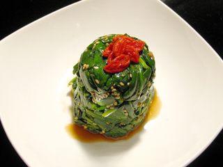 Spinach Salad with Goji Berries and Sesame Dressing step 7: Invert onto a serving plate and garnish with the blanched goji berries before se