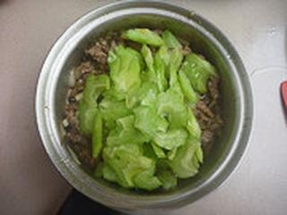 Bitter Gourd and Pork Stir-Fry step 7: Add the blanched bitter gourd to the wok and stir-fry it.