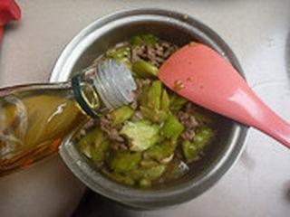 Bitter Gourd and Pork Stir-Fry step 8: Season with salt, light soy sauce, and sugar. Drizzle Sichuan pepper oil over th