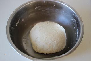 Savory Pork Pastries step 1: Combine the flour, lard, sugar, and water for the water-oil dough. Knead until s