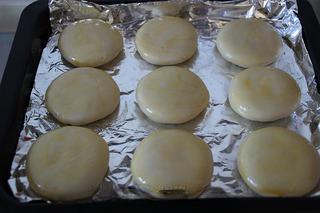 Savory Pork Pastries step 16: Brush the tops with egg yolk wash.