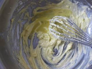 Easy Butter Cookies Recipe step 3: Gradually add the egg liquid in small batches, mixing thoroughly after each addi