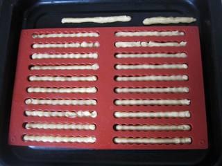 Easy Butter Cookies Recipe step 8: Pipe the dough into cookie molds or onto a lined baking tray.