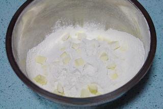 Chocolate Chip Cranberry Cookies step 4: Cut the butter into small cubes and add it to the dry ingredients.