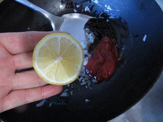 Braised Cod with Tomato Sauce step 8: Squeeze lemon juice into the mixture.