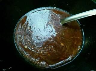 Sweet and Sour Carp Recipe step 7: Prepare the sweet and sour sauce by combining garlic, soy sauce, vinegar, sugar,