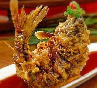 Sweet and Sour Carp Recipe step 8: Pour the hot sweet and sour sauce over the crispy fried carp and serve immediate
