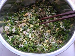 Leek and Dried Shrimp Stuffed Pan-Fried Pancakes step 11: Season with five-spice powder and salt.