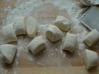 Leek and Dried Shrimp Stuffed Pan-Fried Pancakes step 14: Roll the dough into a rope and divide it into 9–10 equal pieces.