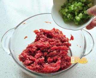 Beef and Scallion Stuffed Pancake step 7: Add sesame oil and chopped scallions.