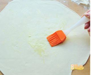 Beef and Scallion Stuffed Pancake step 9: Divide the dough into 4 portions. Roll each portion into a large square or recta