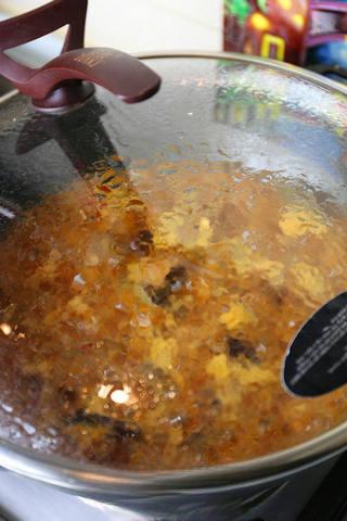 Braised Lamb Leg with Carrots step 8: Bring to a boil, then reduce the heat to low. Cover and simmer for about 40 minu