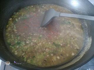 Beef and Vegetable Egg Drop Soup step 14: Add the carrot and cucumber cubes. Simmer for 1–2 minutes.