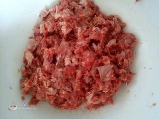 Beef and Vegetable Egg Drop Soup step 8: Season the beef with soy sauce, black pepper, cornstarch, egg white, and sesame 