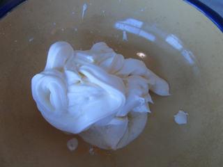 Creamy Yogurt Strawberry Ice Cream step 2: Whip the heavy cream until thick and fluffy, forming soft to medium peaks.