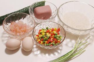 Thai Fried Rice with Vegetables and Seafood step 1: Prepare the jasmine rice, diced carrots, green peas, corn kernels, cucumber, egg