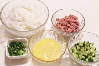 Thai Fried Rice with Vegetables and Seafood step 3: Dice the cucumber, slice the ham sausage, beat the eggs, and finely chop the sca