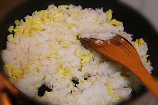 Thai Fried Rice with Vegetables and Seafood step 9: Add the cooled rice and stir-fry until the grains separate and heat evenly.