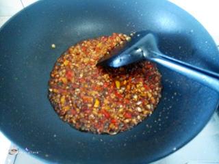 Pan-Fried Tofu with Egg and Bell Peppers step 10: Add the chopped pickled chili, soy sauce, oyster sauce, and water. Stir well to 