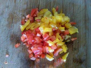 Pan-Fried Tofu with Egg and Bell Peppers step 2: Dice the red and yellow bell peppers.