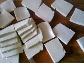 Pan-Fried Tofu with Egg and Bell Peppers step 4: Cut the tofu into slices about 1 cm thick.
