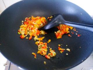 Pan-Fried Tofu with Egg and Bell Peppers step 9: Add a little oil to the pan. Stir-fry the bell peppers, ginger, garlic, and gree