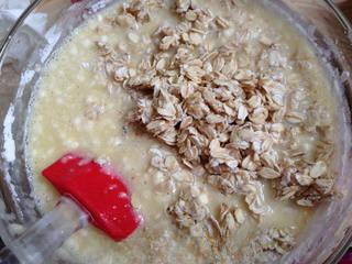 Oatmeal Muffins step 6: Add the oats to the batter.