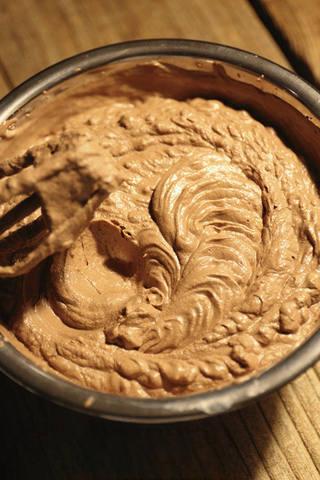 Cherry Chocolate Tart step 10: Prepare the chocolate filling by heating the milk, cream, butter, and chocolate 