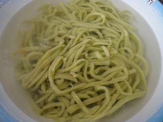 Spinach Handmade Noodles step 8: Drain the noodles and rinse briefly under cool water to improve texture and prev
