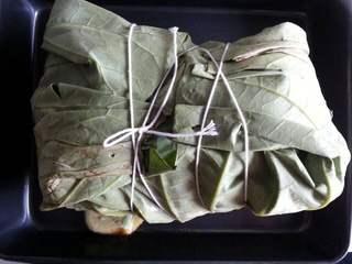 Five-Spice Roasted Chicken step 10: Wrap the marinated chicken in a lotus leaf if available, then tie securely with