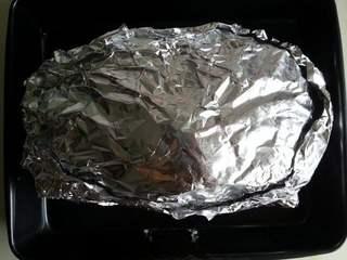 Five-Spice Roasted Chicken step 11: Preheat the oven to 190°C (375°F). Wrap the chicken tightly in two layers of alu