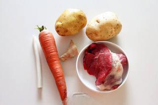Beef and Vegetable Stew step 1: Cut the beef into large chunks. Peel and cut the potatoes and carrot into bite-s