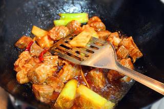 Beef and Vegetable Stew step 7: Pour in enough hot water to completely cover the ingredients. Season with salt.