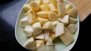 Candied Apple Fritters step 2: Cut the apples into evenly sized bite-sized chunks or diamond-shaped pieces.