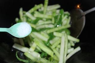 Stir-Fried Cucumber Peel and Green Peppers step 6: Season with a little salt and stir well.