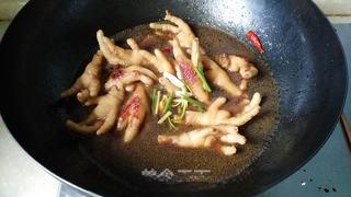 Braised Chicken Feet step 10: Add enough boiling water to cover the chicken feet. Add five-spice powder and sc