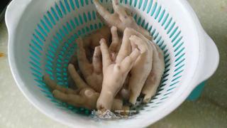 Braised Chicken Feet step 4: Drain the chicken feet, rinse them clean, and set aside.