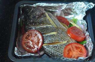 Baked Tilapia with Vegetables step 8: Brush the remaining marinade evenly over the entire fish.