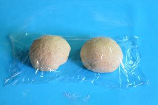 Whole Wheat Sandwich Bread Recipe step 4: Punch down the dough to release trapped air, divide it into two portions, and le