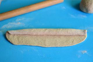 Whole Wheat Sandwich Bread Recipe step 6: Roll the dough tightly from one end to create a loaf shape.