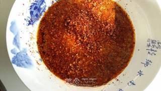 Homemade Spicy Chili Oil step 5: Add the second portion of chili flakes and pour another ladle of hot oil over th