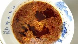 Homemade Spicy Chili Oil step 6: Pour in the remaining infused oil and stir thoroughly. Let cool completely befor
